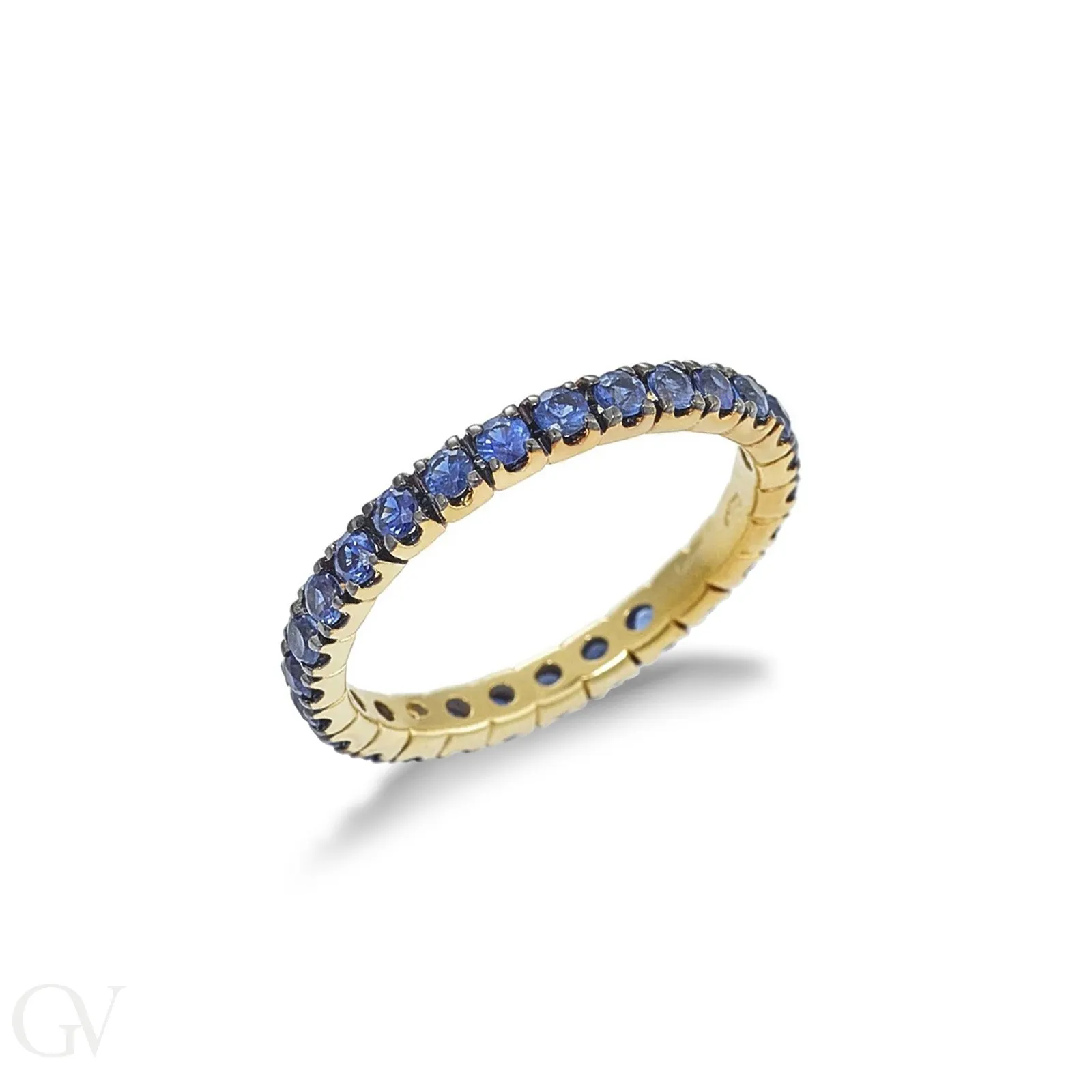 Anello Eternity a griffe in Oro Giallo 18k con Zaffiri Blu